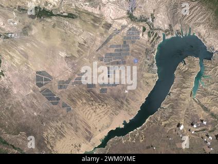 Color satellite image of Longyangxia Dam Solar Park, in China’s western province of Qinghai in 2022. Stock Photo