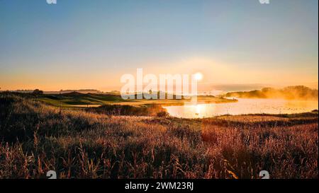 Sunrise on the golf course with fog and mist in Ontario, Canada Stock Photo
