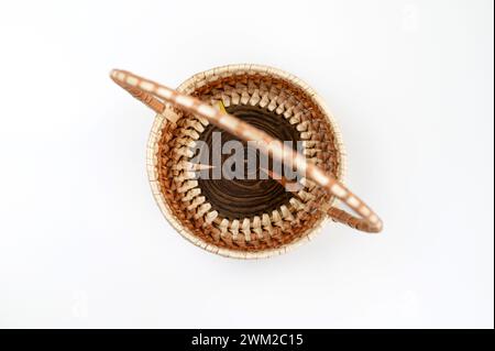 Handmade wicker basket isolated on the white background. Top view Stock Photo