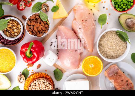 Clean Eating Diet foods background, fruits, vegetables, lean proteins, whole grains and healthy fats, nuts, legumes, chicken meat, fresh fish, beans o Stock Photo