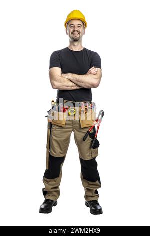 Smiling male builder in workwear with arms crossed on a transparent background Stock Photo