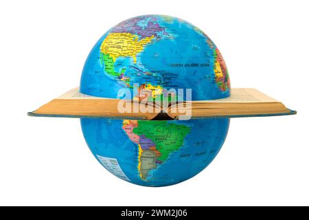 Globe divided by a book where you see America: concept of division and war. Different cultures divide the world. Stock Photo
