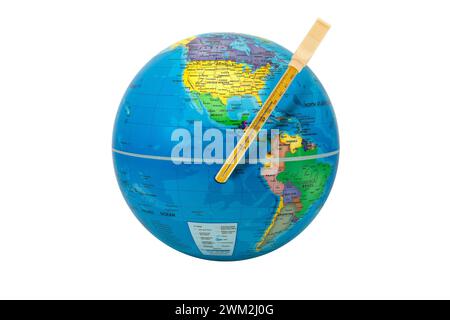 Earth globe with a thermometer showing America: global warming concept, the temperature increases on earth. Stock Photo