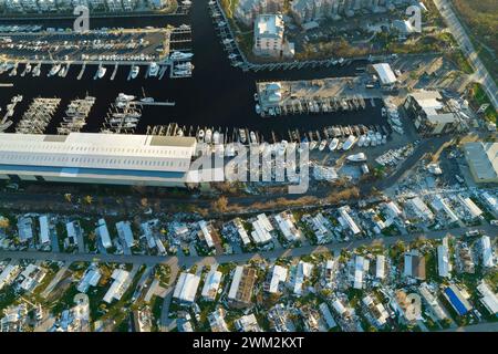 Hurricane Ian destroyed boat station in Florida coastal area. Natural disaster and its consequences. Stock Photo