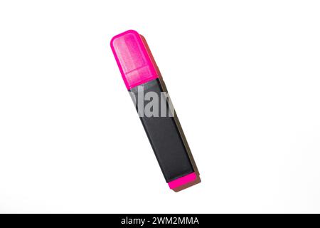 Red highlighter pen laying on white background Stock Photo