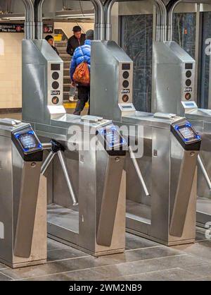 New York City, NY - February 18, 2024:  Subway entrance in New York with new ONMY payment system Stock Photo