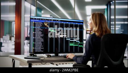 Data Analyst Woman Using Spreadsheet On Computer Stock Photo