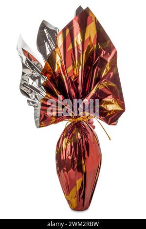 Easter egg wrapped in glittering brown and yellow  paper isolated on white with clipping path included Stock Photo