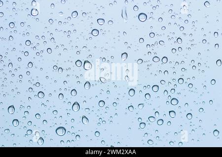 Shot of drops of water on a smooth surface Stock Photo