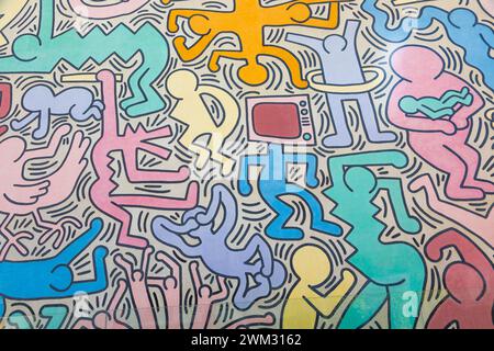 Pisa, Italy - 29 June 2023: Tuttomondo (All World) is the last mural created by American artist Keith Haring in 1989 before his death. Stock Photo