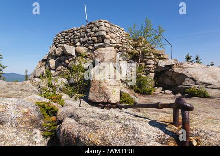 Middle Sister Groundhouse (fire tower) on Middle Sister Mountain in Albany, New Hampshire USA. This fire tower was in operation from 1927-1948. Stock Photo