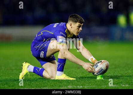 Warrington Wolves' Josh Thewlis lines up a kick during the Betfred Super League match at The Halliwell Jones Stadium, Warrington. Picture date: Friday February 23, 2024. Stock Photo