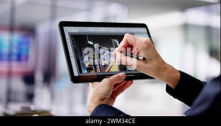Graphic Designer Woman Working On Tablet Computer Screen Stock Photo