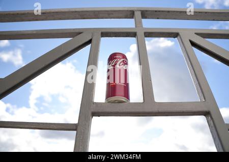KYIV, UKRAINE - 4 MAY, 2023: Coca cola soft drink brand tin can with cherry flavour close up Stock Photo