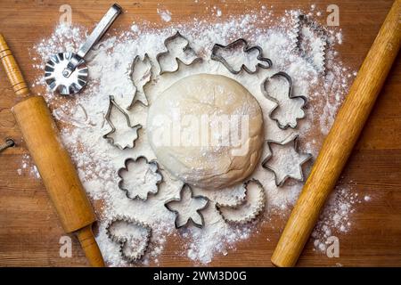 dough on the table with dough tools. forms for squeezing the dough Stock Photo