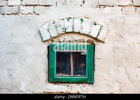 Windows on brick or concrete walls Stock Photo