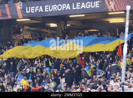Hamburg, Germany - February 15, 2024: Ukrainian supporters show their support during the UEFA Europa League game Shakhtar Donetsk v Marseille at Volksparkstadion in Hamburg, Germany Stock Photo
