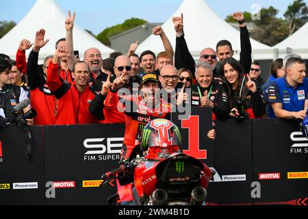 MELBOURNE, AUSTRALIA. 24 February, 2024. Nicolo Bulega(11) of Italy riding the Ducati Panigale V4R celebrates with his Aruba.It Racing - Ducati Team after winning Race 1 of the 2024 World Superbike Championship opening round at Phillip Island Circuit. Credit Karl Phillipson/Alamy Live News Stock Photo