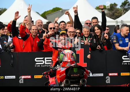 MELBOURNE, AUSTRALIA. 24 February, 2024. Nicolo Bulega(11) of Italy riding the Ducati Panigale V4R celebrates with his Aruba.It Racing - Ducati Team after winning Race 1 of the 2024 World Superbike Championship opening round at Phillip Island Circuit. Credit Karl Phillipson/Alamy Live News Stock Photo