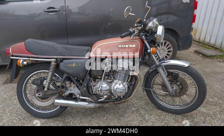 Bordeaux , France -  02 19 2024 : honda 750 four motorbike ancient collector logo brand and text sign on motorcycle original state never restored rust Stock Photo