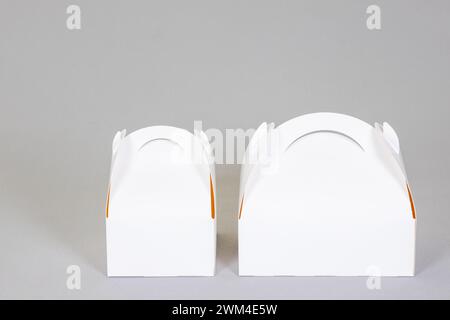 Takeaway two blank mock up cake carton Boxes tasty white box for mockup design empty brand text on grey Background Stock Photo
