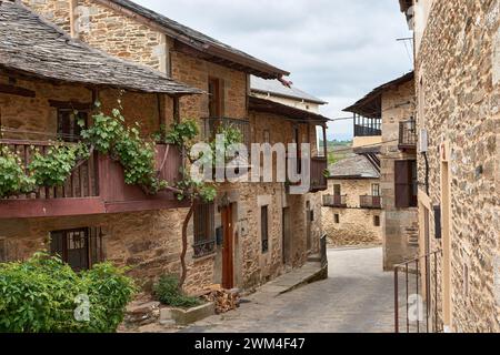 Old village with picturesque stone buildings and flowers in Puebla de Sanabria, Zamora province, Castilla y León, Spain Stock Photo