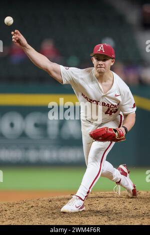 February 23, 2024: Razorback pitcher Jake Faherty #37 jumps with ...