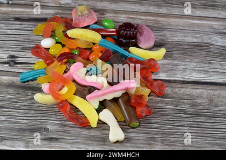 Gummy candy, Gummies, gummi candies, gummy candies, or jelly sweets,  gelatin-based chewable sweets. Gummy sour jelly sweets candies in various shapes Stock Photo