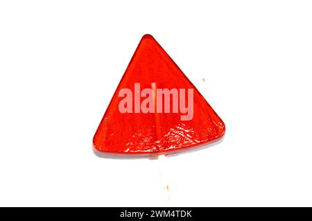 Watermelon flavored lollipop, a type of sugar candy usually consisting of hard candy mounted on a stick and intended for sucking or licking, lolly, su Stock Photo