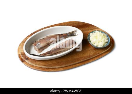 Herring on plate with chopped onions Stock Photo