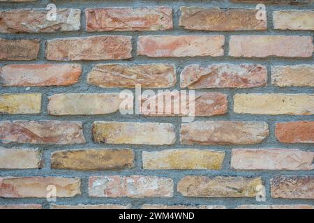 Background from a beige and orange brick wall Stock Photo
