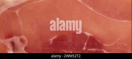dry cured ham texture, jamon background close up Stock Photo