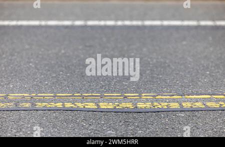 Detail image of a roadway and a double yellow line Stock Photo