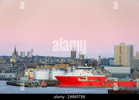 Aberdeen harbour and ship viewed during sunrise Stock Photo