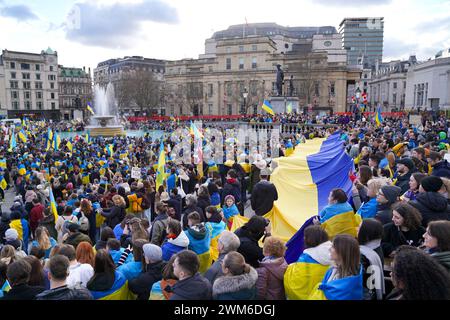 People attend a vigil in Trafalgar Square, central London. To mark the two year anniversary of the Russian invasion of Ukraine. Picture date: Saturday February 24, 2024. Stock Photo