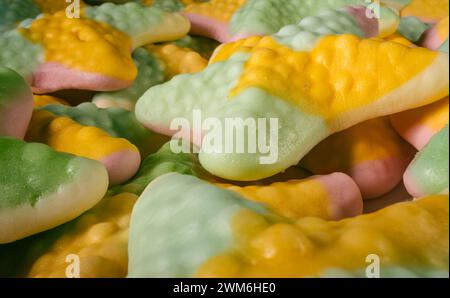 Close up of colorful gummy candies in the shape of a starfish. Stock Photo