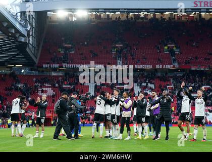 Manchester, UK. 24th Feb, 2024. Fulham players celebrate their win during the Premier League match at Old Trafford, Manchester. Picture: Andrew Yates/Sportimage Credit: Sportimage Ltd/Alamy Live News Stock Photo