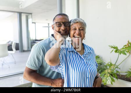 Senior biracial couple sharing a joyful moment together Stock Photo