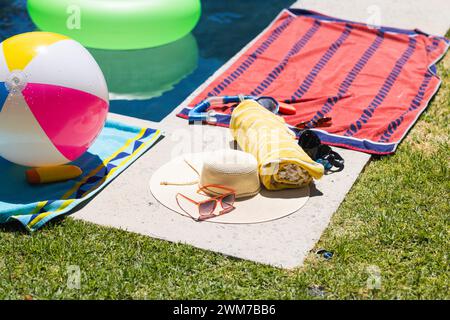 A colorful beach setup on the grass, with copy space Stock Photo