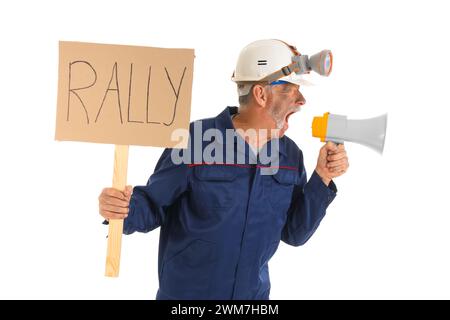 Protesting mature miner man with placard shouting into megaphone on white background Stock Photo