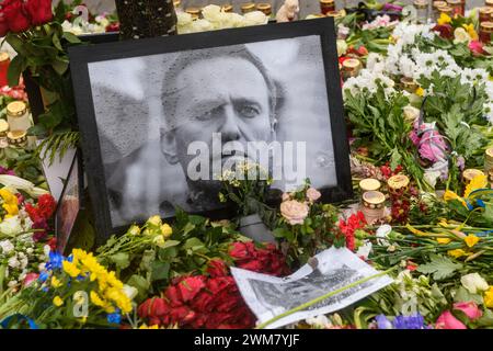 RIGA, LATVIA. 24th February 2024. People pay tribute to Alexei Navalny near Embassy of Russia in Latvia. Stock Photo