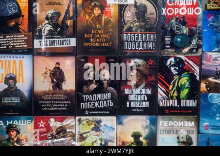Moscow, Russia. 23rd of February, 2024. Souvenir stickers of the Russian Army lie on the counter of a souvenir shop at the VDNH exhibition complex in Moscow, Russia Stock Photo
