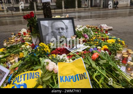RIGA, LATVIA. 24th February 2024. People pay tribute to Alexei Navalny near Embassy of Russia in Latvia. Stock Photo