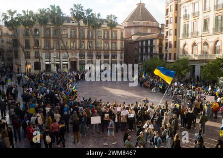 Malaga, Spain. 24th Feb, 2024. Protesters gather at Plaza de la Constitucion square as they take part in an anti-war protest between Ukraine and Russia. Marking the second anniversary of the Russian invasion of Ukraine, hundreds of people have gathered at Plaza de la Constitucion square in solidarity with Ukraine people, against the war and calling for peace. (Photo by Jesus Merida/SOPA Images/Sipa USA) Credit: Sipa USA/Alamy Live News Stock Photo