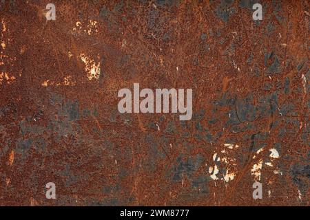 Brown Coloured Rust on Metal with Cracked Paint Stock Photo