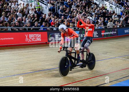 MANCHESTER, UNITED KINGDOM. 24th Feb, 24. Bates (MBE)  Latham of team BPM and McDonald  Duggleby of team PDQ action in Paracyling Men's B Pursuit Final of day 2 events during 2024 British National Track Championships at National Cycling Centre on Saturday, February 24, 2024 in MANCHESTER, UNITED KINGDOM. Credit: Taka G Wu/Alamy Live News Stock Photo