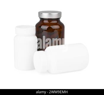 Bottles with vitamin capsules isolated on white Stock Photo