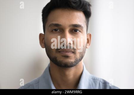 Closeup portrait of serious Indian bearded guy Stock Photo