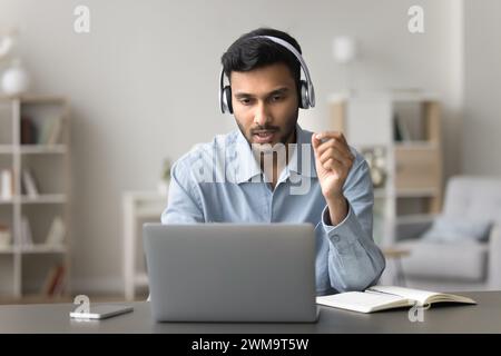 Indian man lead business negotiations using videocall application Stock Photo