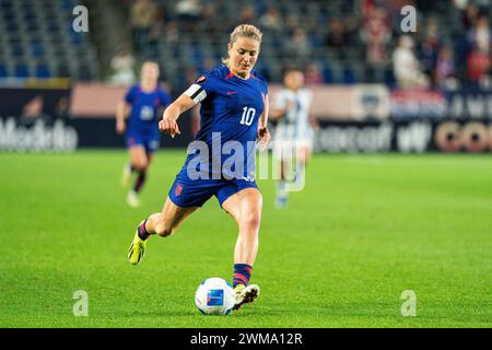 United States midfielder Lindsey Horan (10) takes a shot during the Concacaf W Gold Cup Group A match against Argentina, Friday, February 23, 2024, at Stock Photo